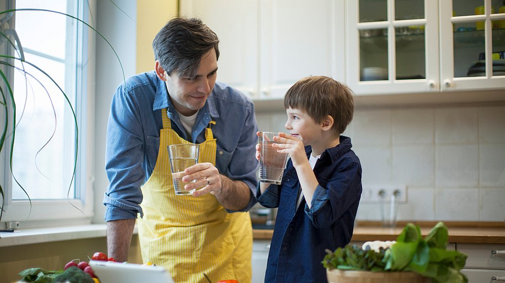 Father and son drinking alkaline water | Reasons to Love Tyent Water Ionizers